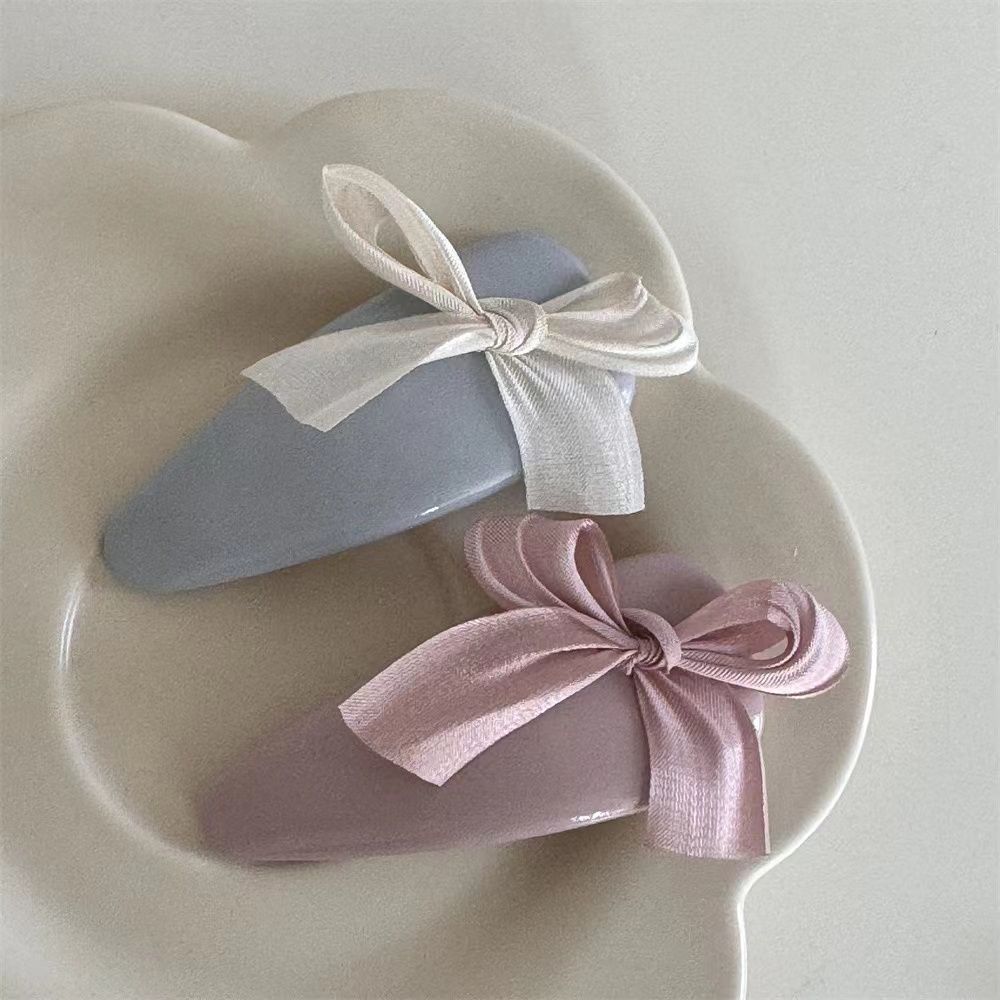 WhatsAppImage2025-07-03at12.05.06PM Blue Leather Bow Hair Clip – Cute Waterdrop BB Clip for Girls - Image 1