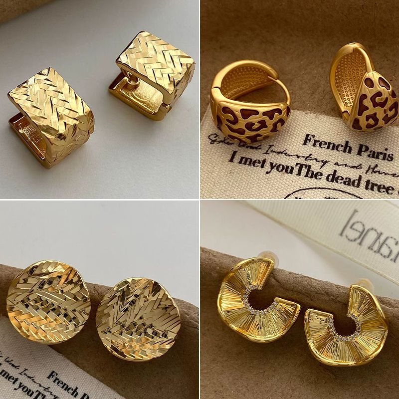 9f9fadf9-08fe-4d60-b316-8e10f35ce656.jpeg.a Gold Irregular Texture Stud Earrings – Leopard Pattern Design - Image 1