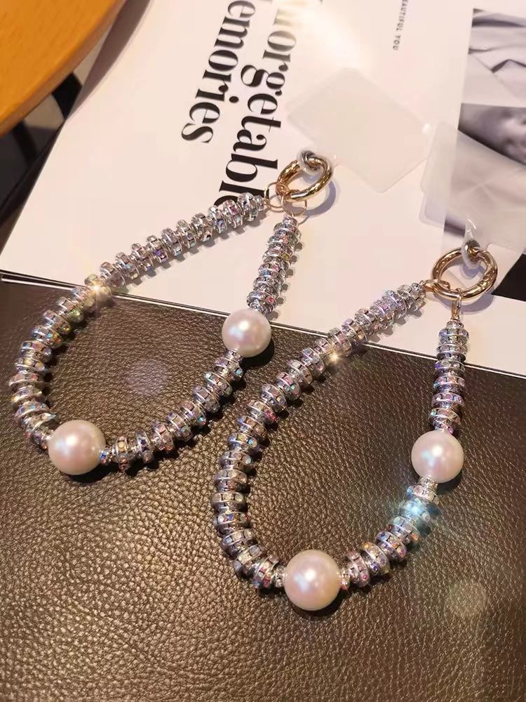 WhatsAppImage2024-10-04at09.37.50_c5aa46b7 Luxury Pearl and Rhinestone Phone Lanyard, Wrist Strap, Exquisite Crystal Bracelet Chain, Phone Strap Pendant for Women - Image 1