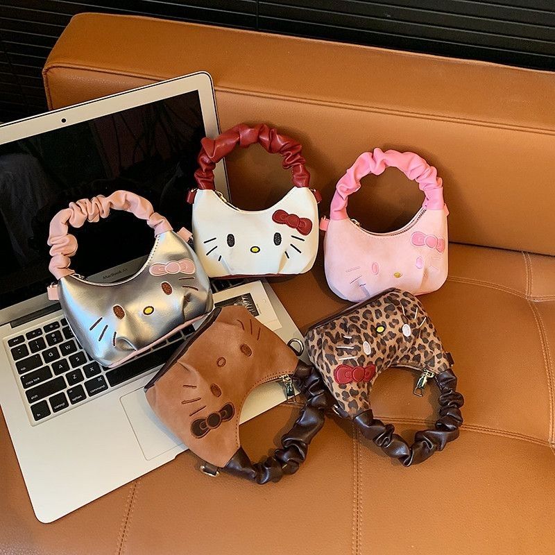 a39ff21b-9e75-4db7-ba59-472ce104820f_d3b2c39d-d3e3-4cb9-a4e5-e19f3febc7eb Cute Girls KT Cat Crossbody Bag - Image 1